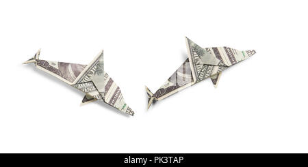 Origami Dolphin von Banknoten Stockfoto