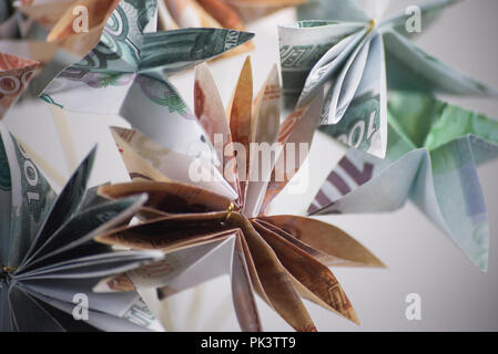 Blumen origami Banknoten Stockfoto