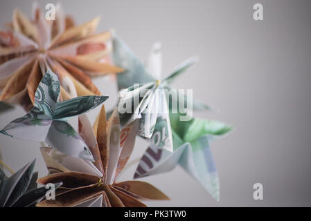 Blumen origami Banknoten Stockfoto