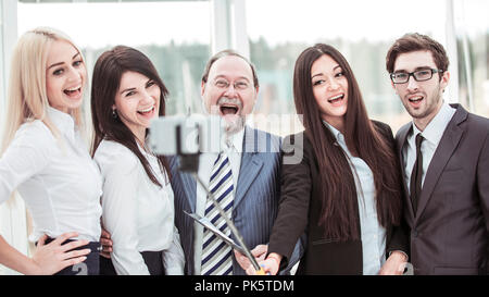 Erfolgreiche Business Team leistet selfie mit Ihrem Manager Stockfoto