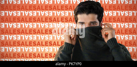 Das zusammengesetzte Bild im Porträt der Mann verstecken Gesicht mit dem Pullover Stockfoto