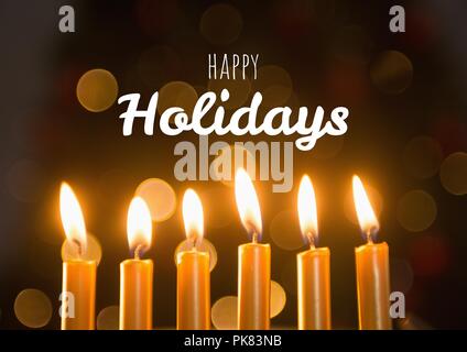 Happy holidays Text mit Kerzen Stockfoto
