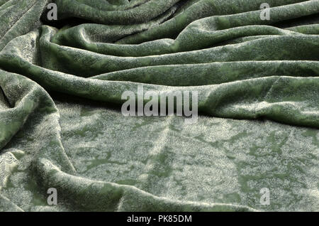 Seide Viskose Gewebe. Velvet mit blauem Muster spritzen auf Grün. Stockfoto
