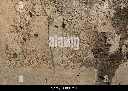 Alte Stuck Wand in die archäologische Stätte von Pompeji (Pompei) in der Nähe von Neapel, Kampanien, Italien. Stockfoto