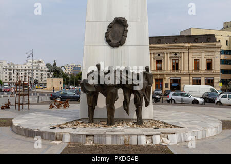 Das Denkmal der Wiedergeburt, auf dem Platz der Revolution, mit dem ehemaligen Zentralkomitee Gebäude, Bukarest, Rumänien. Stockfoto