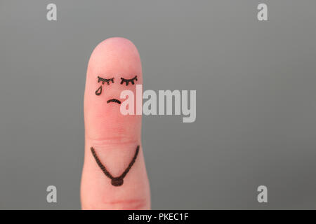 Finger Kunst der einsame Frau weint. Stockfoto