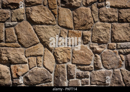 Cyclop Steinmauer, Stapelung Hintergrund und Textur - Rohstein Oberfläche Stockfoto