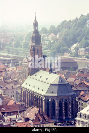 Kirche des Heiligen Geistes (Heiliggeistkirche), Heidelberg, Deutschland. Wie vom Heidelberger Schloss gesehen. Original Archiv Bild im September 1979 übernommen. Stockfoto