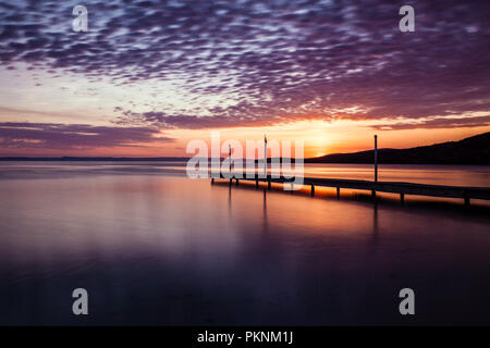 Jetty und Meer bei Sonnenuntergang, La Paz, Baja California Sur, Mexiko Stockfoto