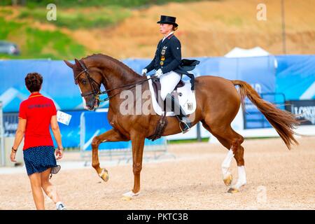 Tryon, USA. 14. September 2018. Sieger. Goldmedaille. Isabell Werth, Bella Rose. GER. FEI einzelne Meisterschaft. Grand Prix Special. Dressur. Warm up. Tag 4. World Equestrian Games. WEG 2018 Tryon. North Carolina. USA. 14.09.2018. Credit: Sport in Bildern/Alamy leben Nachrichten Stockfoto