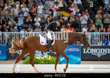 Tryon, USA. 14 Sep, 2018. Reiten, FEI World Equestrian Spiel 2018, Grand Prix Special: Isabell Werth feiert ihren Sieg an Bella Rose. Quelle: Stefan Lafrentz/dpa/Alamy leben Nachrichten Stockfoto