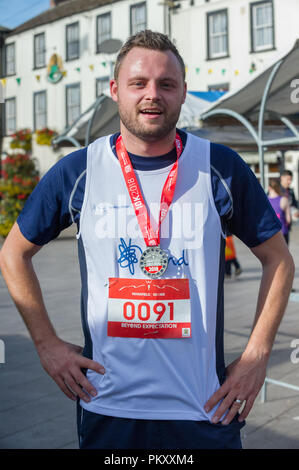 Mansfield, Nottinghamshire, England, UK. 16.September 2018. Ben Bradley die heraus gesprochen, Tory M.P. für Mansfield konkurrieren in der Mansfield 10 k und der Fertigung in 150 Platz 607 mit einer Zeit von 49 min. 50sec. Alan Beastall/Alamy leben Nachrichten Stockfoto