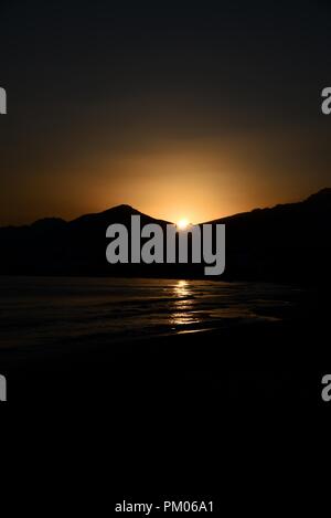 Sonnenuntergang bei Makris Gialos, Crete, Griechenland. Stockfoto