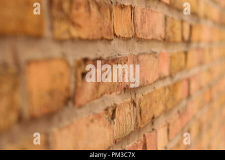 Brick Steinmauer in Gelb Stockfoto