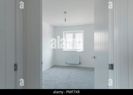 Zimmer geschossen von Eine unmöblierte Schlafzimmer in ein neues Zuhause. Stockfoto