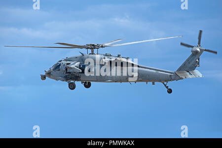 USNAVY MH-60 Seahawk Hubschrauber auf schießwesen Ausbildung Übung in Tain Strecke, die Fliegen aus der RAF Basis in Lossiemouth in Moray, Schottland. Stockfoto