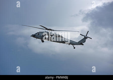 USNAVY MH-60 Seahawk Hubschrauber auf schießwesen Ausbildung Übung in Tain Strecke, die Fliegen aus der RAF Basis in Lossiemouth in Moray, Schottland. Stockfoto