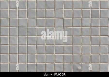 Kleine weiße Kacheln an der Wand Textur Stockfoto