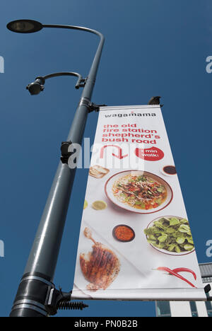 Banner anmelden, Hammersmith, London, England, für eine Filiale der wagamama asiatisches Restaurant kette in Bushs in der Nähe hirt Straße Stockfoto