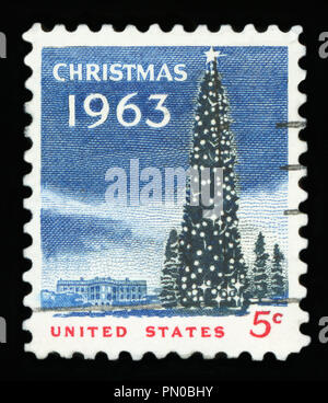 USA - ca. 1963 - uns Weihnachten Briefmarke zeigt das Weiße Haus und die National Christmas Tree in Washington DC., ca. 1963. Stockfoto