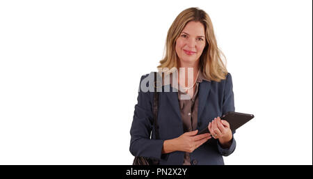 Erwachsene business Frau mittleren Alters mit tablet device Stockfoto