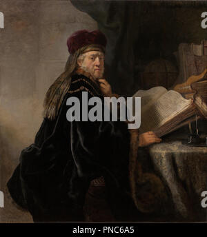 Ein Gelehrter sitzt an einem Schreibtisch (Scholar an seiner Studie). Datum/Zeit: 1634. Malerei. Öl auf Leinwand. 141 × 135 cm (55.5 x 53.1 in.). Thema: Rembrandt, HARMENSZOON VAN RIJN. Rembrandt van Rhijn. Stockfoto