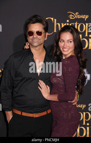 John Stamos, Caitlin McHugh 30.07.2018 Die Weltpremiere von "Christopher Robin' an die Walt Disney Studios in Burbank, CA Foto von Izumi Hasegawa/HNW/PictureLux Stockfoto