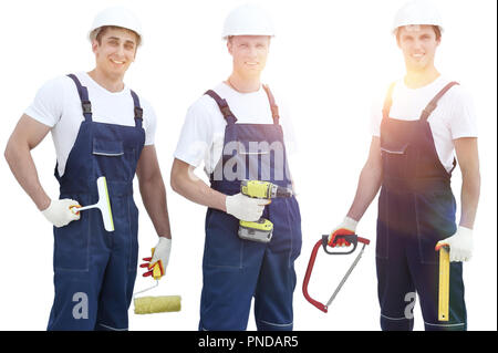 Gruppe von Bauherren in Overalls auf weißem Hintergrund Stockfoto