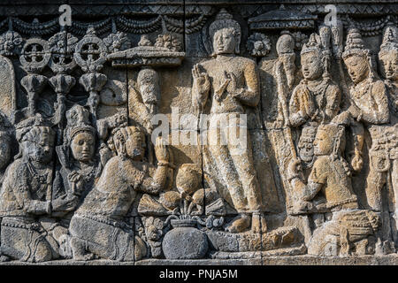 Detail der BAS-Reliefs, Candi Borobudur buddhistischen Tempel, Muntilan, Java, Indonesien Stockfoto