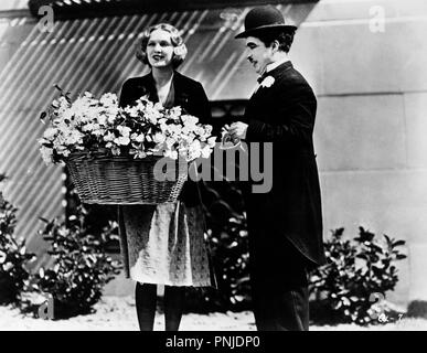 Original Film Titel: Lichter der Stadt. Englischer Titel: Lichter der Stadt. Jahr: 1931. Regisseur: Charlie Chaplin. Stars: Charlie Chaplin, VIRGINIA CHERRILL. Quelle: UNITED ARTISTS/Album Stockfoto