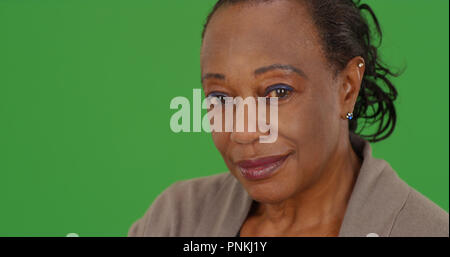 Close-up Portrait eines älteren African American Woman auf Green Screen Stockfoto