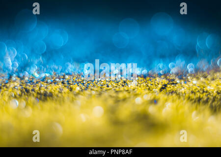 Abstraktion bunte Bokeh auf einem dunklen Hintergrund. Defokussiert. Freier Platz für Text. Eine quadratische Hintergrund für soziale Netzwerke. Stockfoto