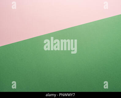 Papier Hintergrund von zwei Farben Grün und Pink. Stockfoto