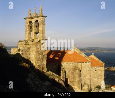 Spanien. Galizien. Provinz La Coruña - ein. Muxi. Pfarrkirche Santa Maria von muxi. Es wurde im 14. Jahrhundert im gotischen sailor Stil über einen früheren Tempel des 12. Jahrhundert erbaut. Stockfoto