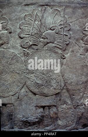 Entlasten DEL PALACIO DE NINIVE - SOLDADO GUARDIAN-650AC. Ort: British Museum. LONDON. ENGLAND. Stockfoto