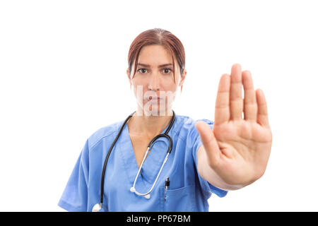 Unglückliche Frau weibliche Krankenschwester, stop Weigerung, Geste, mit der Handfläche nach oben als Krankenhaus arbeiten Ablehnung problem Konzept auf weißem Hintergrund Stockfoto
