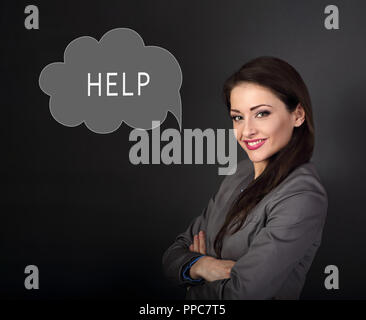 Glücklich lächelnde Business woman auf die Sprechblase mit Hilfe Wort innerhalb, Customer Service Support. Frage zu unterzeichnen. Stockfoto