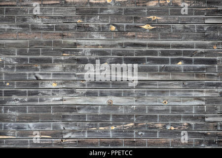 Hintergrund der alten morschen Brettern zu einem Blatt genagelt. Stockfoto