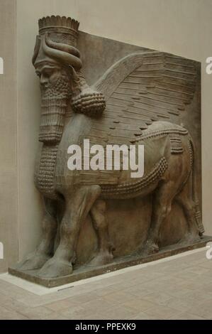 ARTE MESOPOTAMICO. ASIRIO. TORO ANDROCEFALO, Guardian de la Entrada del Palacio de Sargón II. Dur Sharrukin, Antigua Asiria (tatsächliche Khorsabad en Irak). 713-716 ein. C. Siglo VIII ein. C. Museo del Louvre. París. Francia. Stockfoto