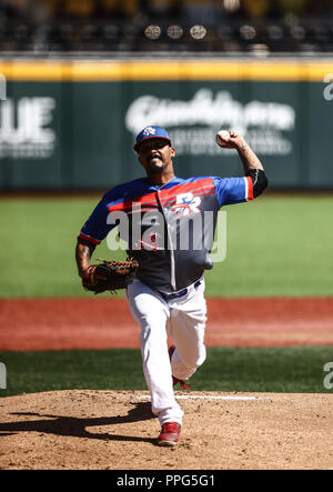 Giovanni Soto. . Acciones, durante el Partido de Beisbol entre Criollos de Caguas Puerto Rico contra las Águilas Cibaeñas de Republica Dominicana, Stockfoto