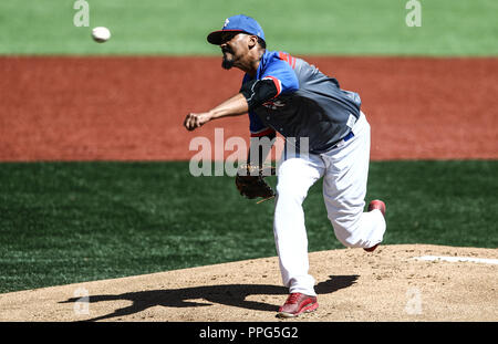 Giovanni Soto. . Acciones, durante el Partido de Beisbol entre Criollos de Caguas Puerto Rico contra las Águilas Cibaeñas de Republica Dominicana, Stockfoto