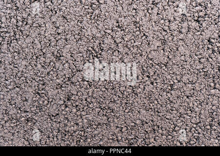 Oberfläche grunge raue Asphalt Asphalt dunkel, körnig Straße, Ansicht von oben Stockfoto