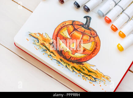 Zeichnung von Markern im Skizzenbuch Halloween Kürbis Stockfoto