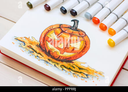 Zeichnung von Markern im Skizzenbuch Halloween Kürbis Stockfoto