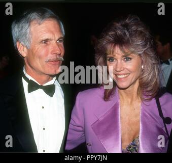 *** Foto *** Ted Turner deckt er die Lewy-Körperchen-Demenz Ted Turner und Jane Fonda 1991 Foto von John Barrett/PHOTOlink/MediaPunch Stockfoto