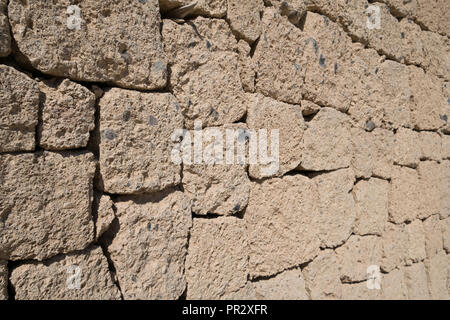Ignimbrite Steinmauer - Naturstein Wand Hintergrund, Stockfoto