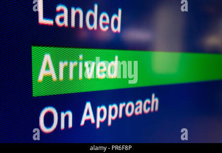 Flug kam Informationen über Zeichen in der Ankunftshalle im Flughafen Manchester, Großbritannien Stockfoto