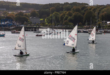 Crosshaven, Cork, Irland. 30. September 2018. Drei Laser Segeln dinghys Zurück zur Royal Cork Yacht Club nach einem Morgen in den Hafen. Quelle: David Creedon/Alamy leben Nachrichten Stockfoto