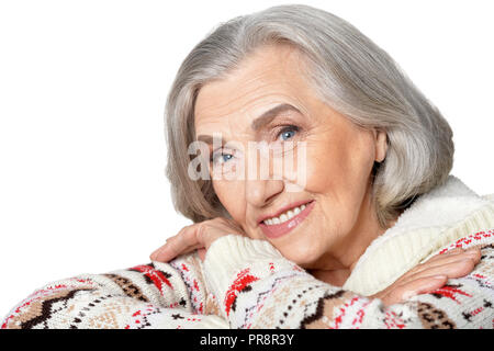 Portrait von Schöne ältere Frau auf weißem Hintergrund posiert Stockfoto