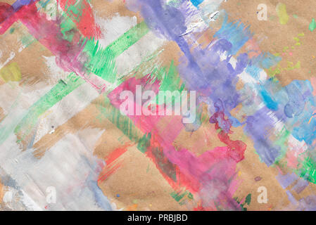 Bunte Kleckse auf Recyclingpapier Hintergrund Textur Stockfoto